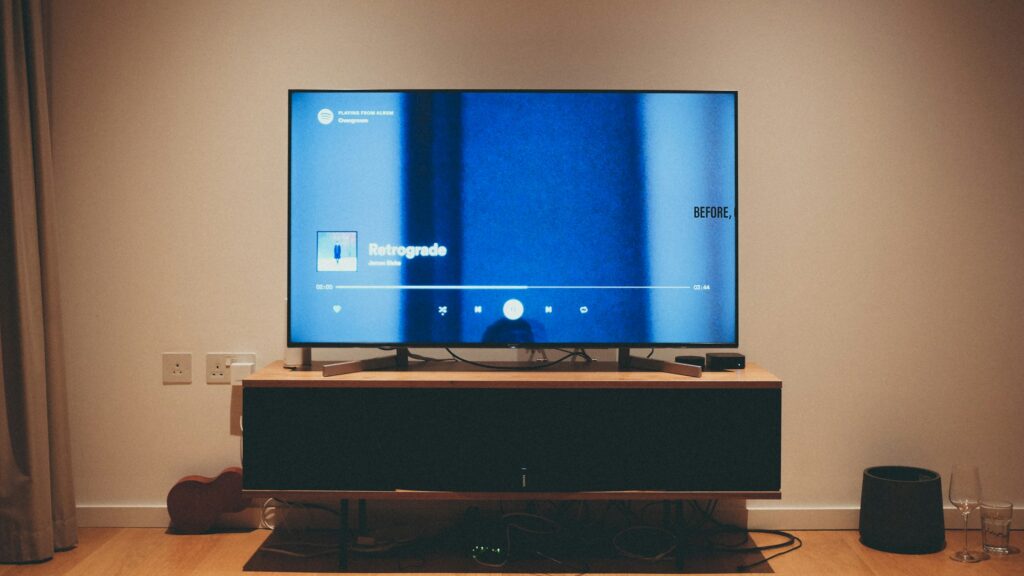Smart TV streaming content on a living room TV stand